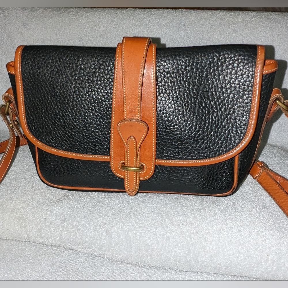 Vintage Dooney and Bourke All weather black and tan leather crossbody ba…